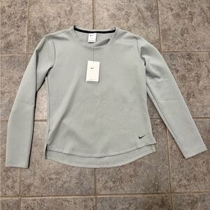Nike Women's Light Gray Long Sleeve Therma-Fit Shirt